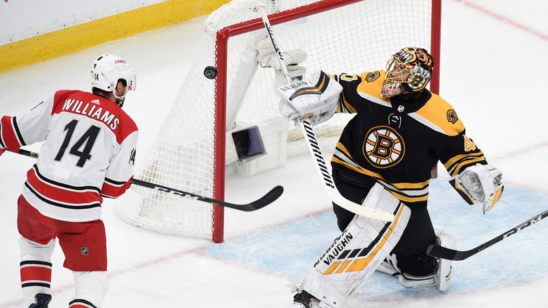 Boston Bruins Goalie Tuukka Rask And Carolina Hurricanes Right Wing Justin Williams