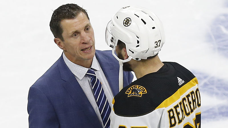 Boston Bruins forward Patrice Bergeron, Hurricanes coach Rod Brind'Amour