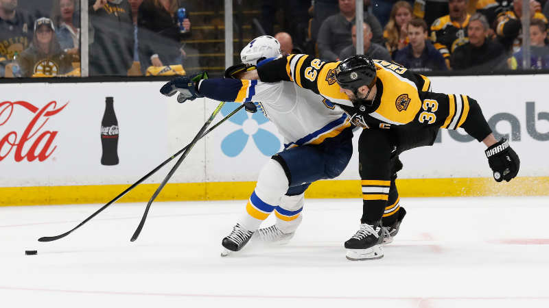 Boston Bruins defenseman Zdeno Chara (33) and St. Louis Blues right wing Vladimir Tarasenko (91)