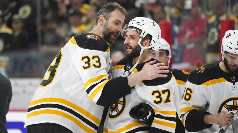 Boston Bruins Defenseman Zdeno Chara And Center Patrice Bergeron