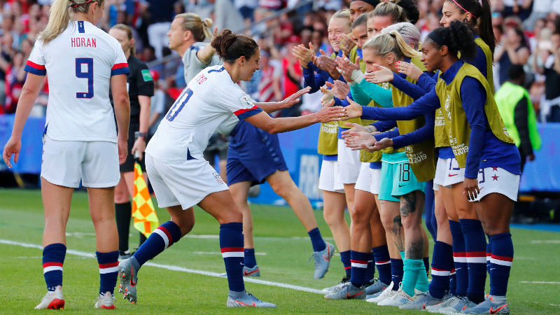 United States forward Carli Lloyd (10) and teammates