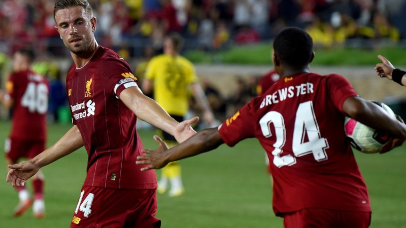 Liverpool midfielder Jordan Henderson (left) and forward Rhian Brewster