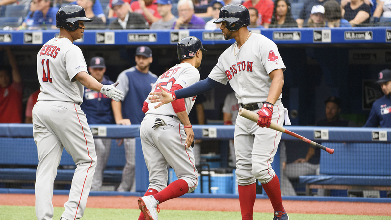 Boston Red Sox's Rafael Devers, Xander Bogaerts And Mookie Betts