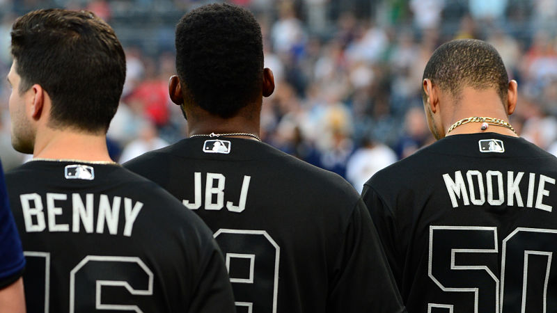 Boston Red Sox outfielders Andrew Benintendi, Jackie Bradley Jr. and Mookie Betts