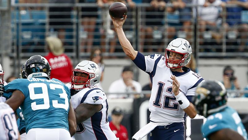 Jacksonville Jaguars defensive lineman Calais Campbell and New England Patriots quarterback Tom Brady