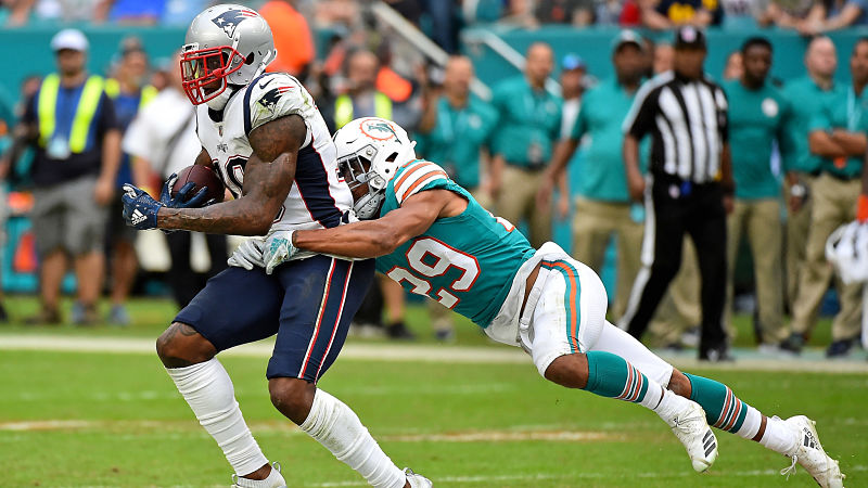 Miami Dolphins free safety Minkah Fitzpatrick and New England Patriots wide receiver Josh Gordon