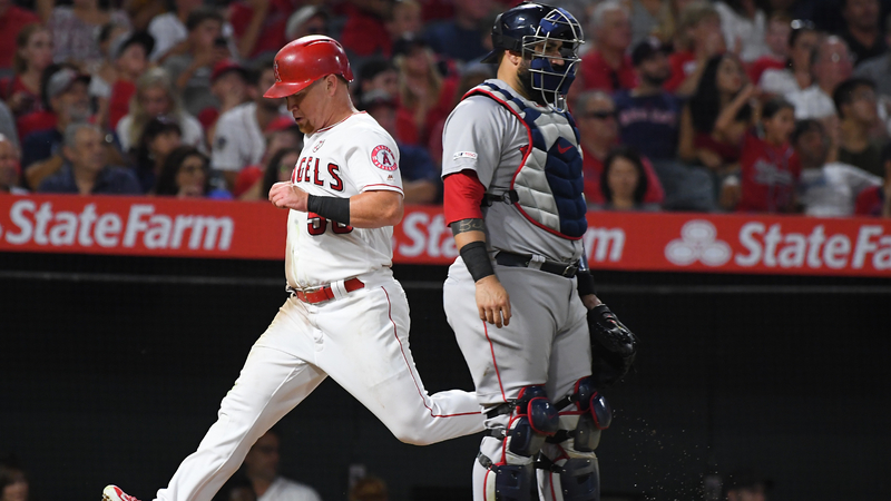 Los Angeles Angels Right Fielder Kole Calhoun And Boston Red Sox Catcher Sandy Leon