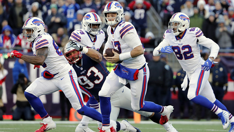 New England Patriots defensive lineman Lawrence Guy and Buffalo Bills quarterback Josh Allen