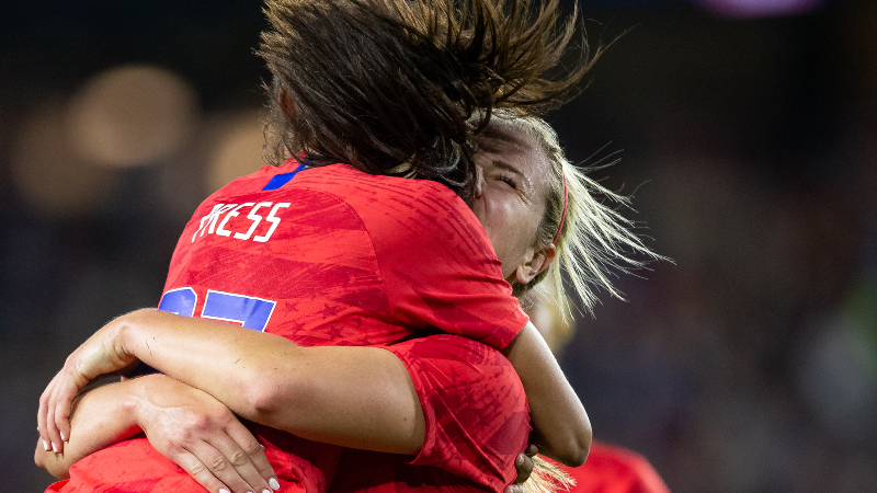 United States midfielder Lindsey Horan (9) and forward Christen Press (23)