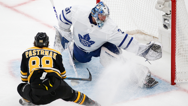 Toronto Maple Leafs goaltender Frederik Andersen (31) and Boston Bruins right wing David Pastrnak (88)