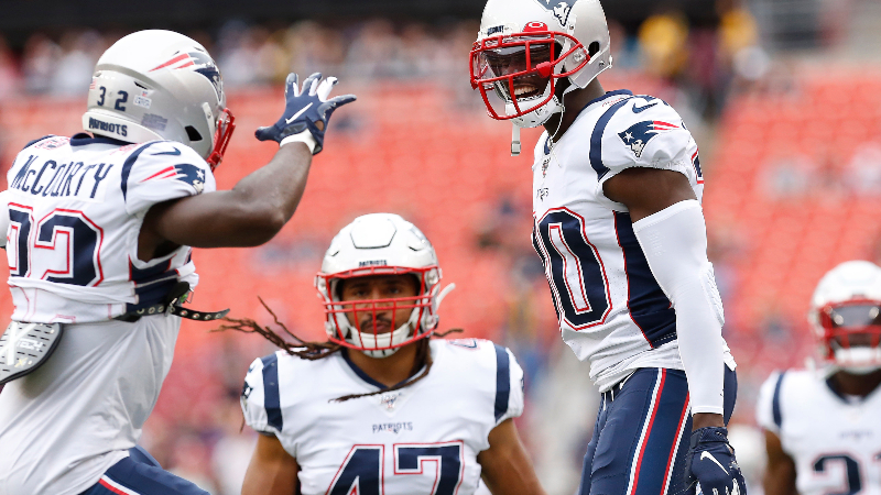 and fullback Jakob Johnson (center)