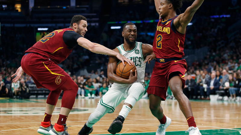 Boston Celtics guard Kemba Walker (center), Cleveland Cavaliers guard Collin Sexton (right), forward Larry Nance Jr. (left)