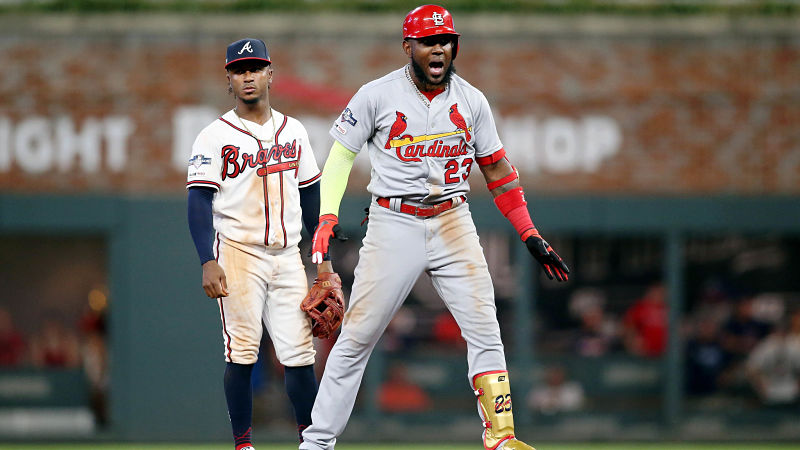Atlanta Braves second baseman Ozzie Albies and St. Louis Cardinals left fielder Marcell Ozuna