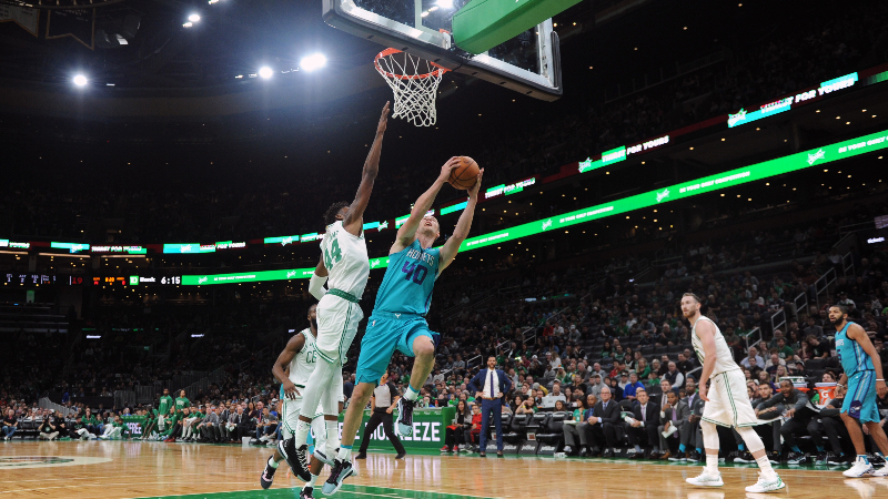 Charlotte Hornets forward Cody Zeller (40) and Boston Celtics center Robert Williams III (44)