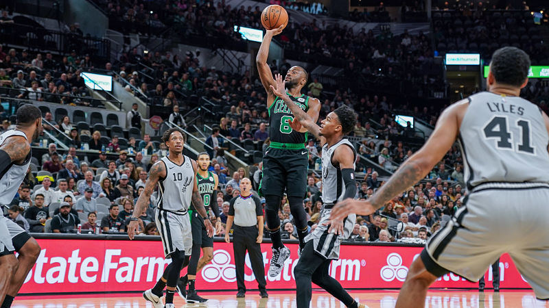 San Antonio Spurs guard DeMar DeRozan and Boston Celtics guard Kemba Walker