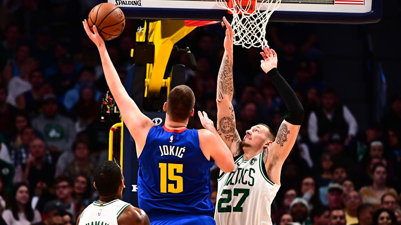 Denver Nuggets center Nikola Jokic and Boston Celtics forward Daniel Theis