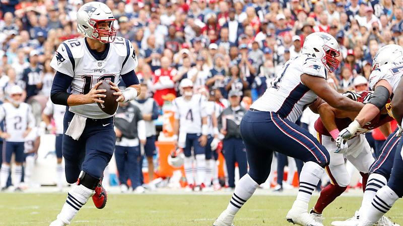 New England Patriots quarterback Tom Brady and right tackle Marcus Cannon