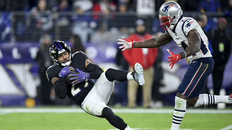 Baltimore Ravens safety Earl Thomas and New England Patriots wide receiver Mohamed Sanu