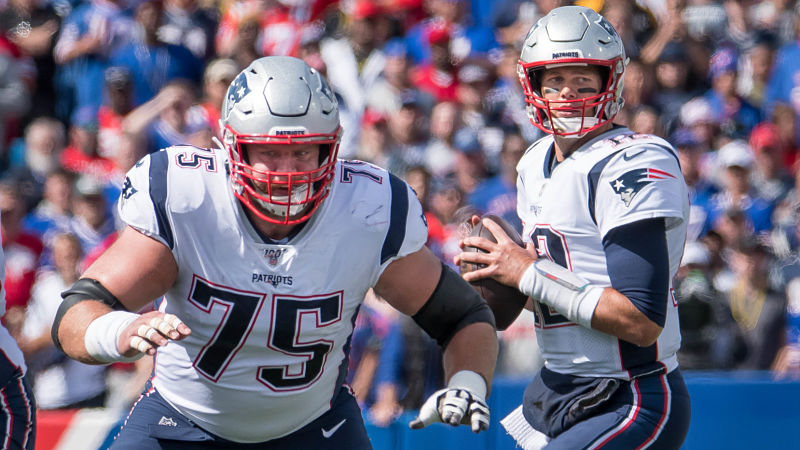 New England Patriots offensive lineman Ted Karras and quarterback Tom Brady