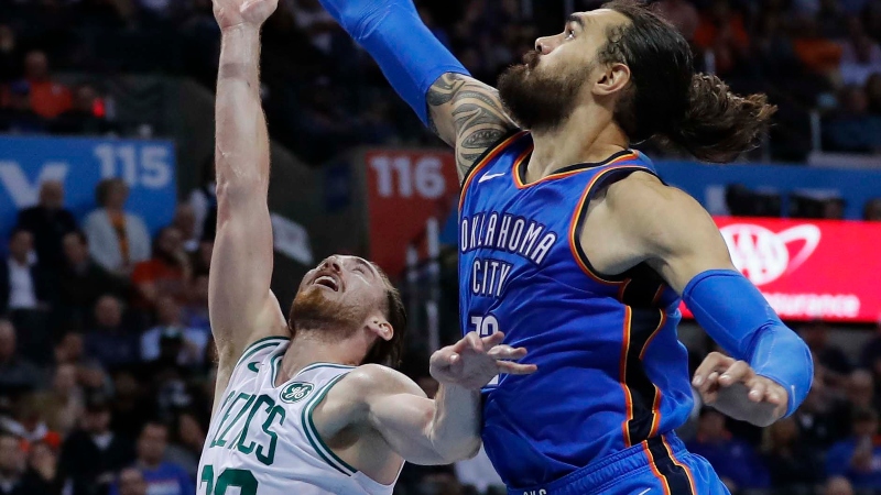 Oklahoma City Thunder center Steven Adams (12) and Boston Celtics forward Gordon Hayward (20)