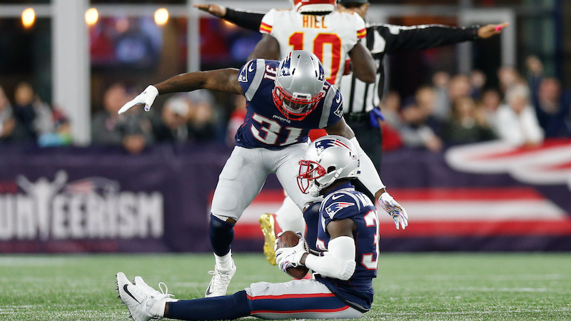 Patriots defensive backs Jonathan Jones, Devin McCourty