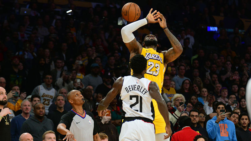 Los Angeles Clippers guard Patrick Beverley and Los Angeles Lakers forward LeBron James