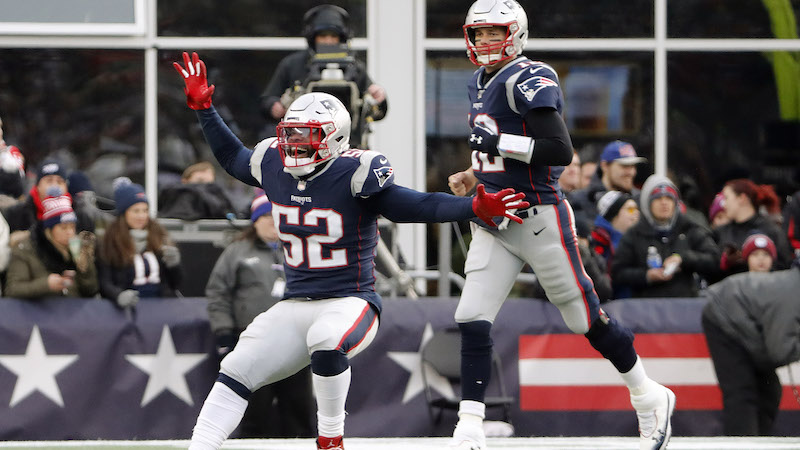 Patriots linebacker Elandon Roberts, quarterback Tom Brady