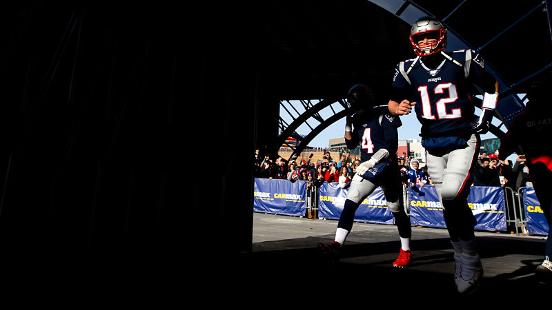 New England Patriots quarterbacks Jarrett Stidham and Tom Brady