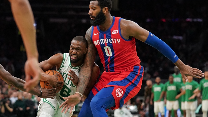 Boston Celtics guard Kemba Walker (8) and Detroit Pistons center Andre Drummond (0)