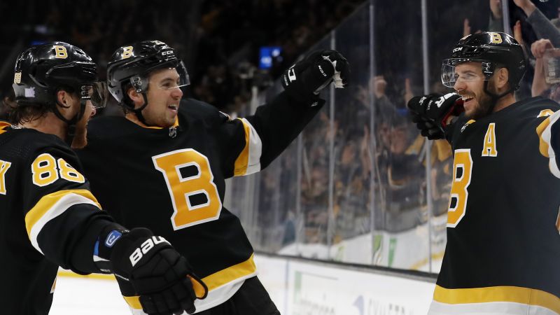 Boston Bruins' Charlie McAvoy, David Pastrnak, David Krejci