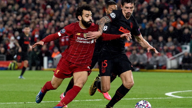 Liverpool forward Mohamed Salah (left) and Atletico Madrid defender Stefan Savic