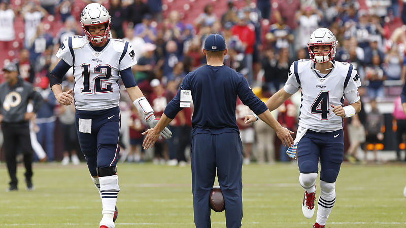 Tampa Bay Buccaneers quarterback Tom Brady and New England Patriots quarterback Jarrett Stidham