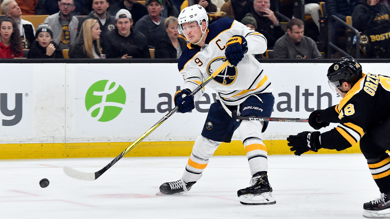 Bruins defenseman Matt Grzelcyk, Sabres center Jack Eichel