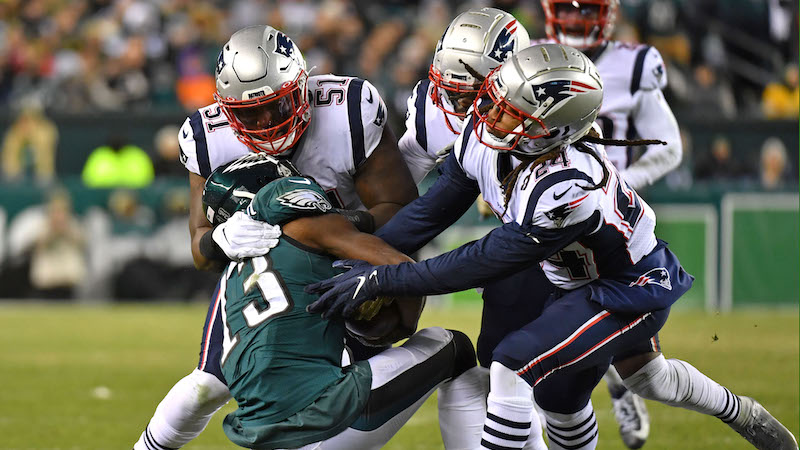 Patriots defenders Ja'Whaun Bentley, Terrence Brooks, Stephon Gilmore