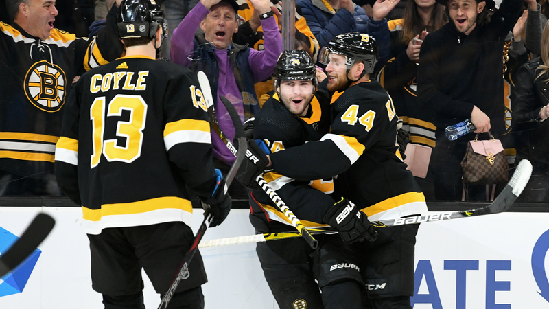 Bruins forwards Jake Debrusk and Charlie Coyle, defenseman Steven Kampfer