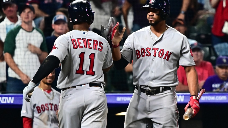 Boston Red Sox third baseman Rafael Devers (11) and shortstop Xander Bogaerts (2)