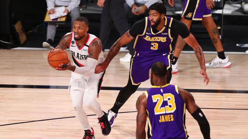 Portland Trail Blazers guard Damian Lillard, Los Angeles Lakers forward Anthony Davis, Los Angeles Lakers forward LeBron James