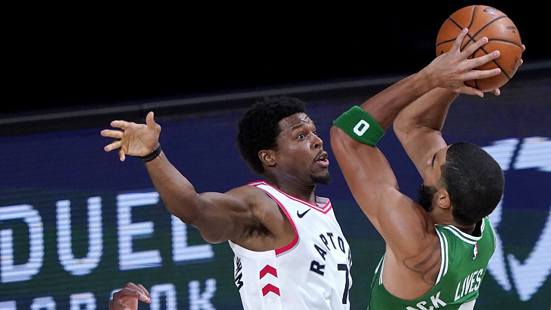 Toronto Raptors guard Kyle Lowry and Boston Celtics forward Jayson Tatum