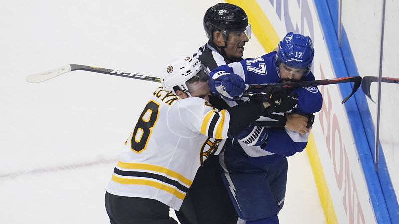 Boston Bruins defenseman Matt Grzelcyk and Tampa Bay Lightning left wing Alex Killorn