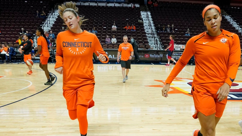 Connecticut Sun forward Theresa Plaisance (55) and center Brionna Jones (42)