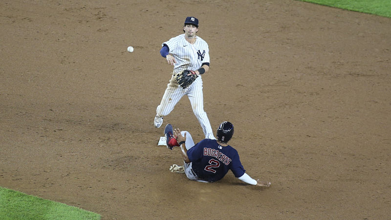 New York Yankees infielder Tyler Wade and Boston Red Sox shortstop Xander Bogaerts