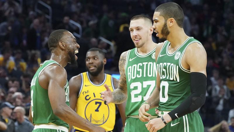 Boston Celtics' Kemba Walker, Jayson Tatum, Daniel Theis