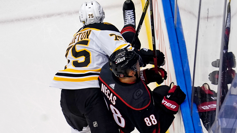 Boston Bruins defenseman Connor Clifton, Carolina Hurricanes winger Matin Necas
