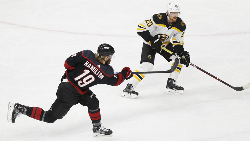 Carolina Hurricanes defenseman Dougie Hamilton, Boston Bruins winger Joakim Nordstrom