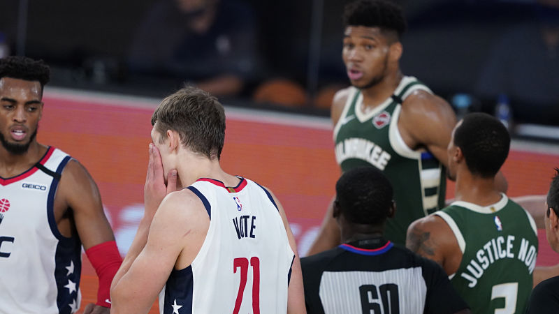Washington Wizards' Moritz Wagner and Milwaukee Bucks' Giannis Antetokounmpo