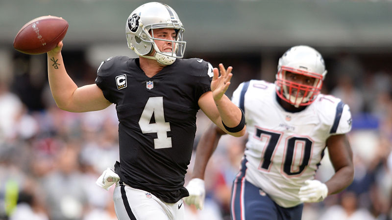 Las Vegas Raiders quarterback Derek Carr and New England Patriots defensive lineman Adam Butler