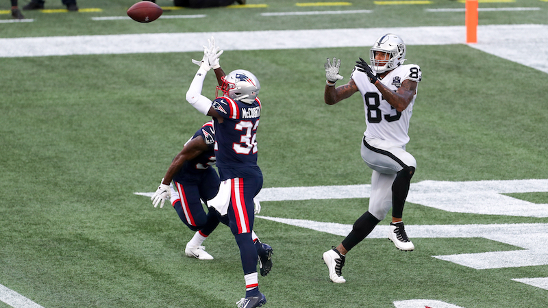 Patriots safety Devin McCourty, Raiders tight end Darren Waller