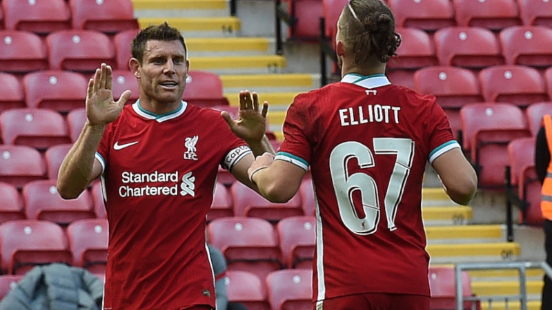 Liverpool midfielder James Milner (left) and forward Harvey Elliot