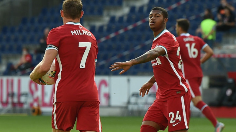 Liverpool midfielder James Milner (left) and striker Rhian Brewster