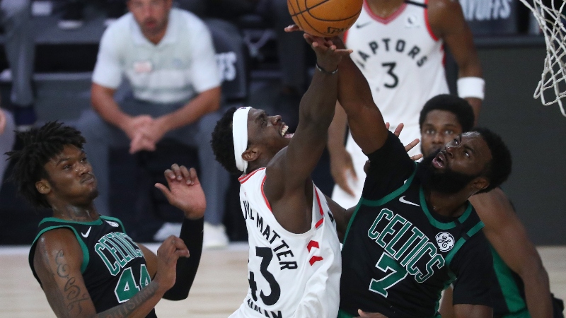 Toronto Raptors forward Pascal Siakam (43) and Boston center Robert Williams III (44) and Celtics guard Jaylen Brown (7)